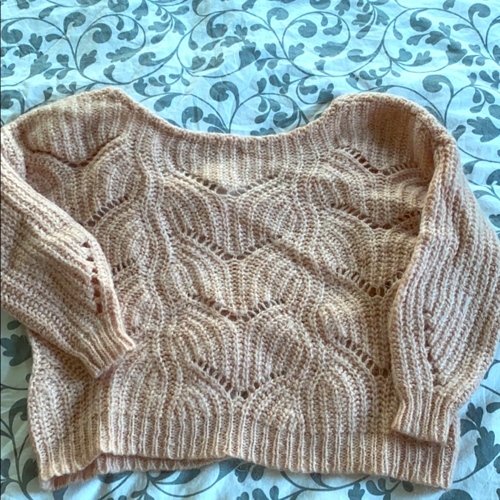 Salmon-colored, scoop-back Sezane wool sweater
